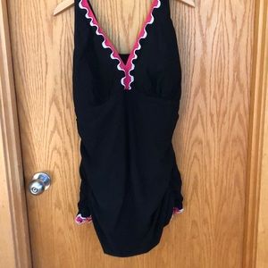 Gortex swim one piece has skirt adjustable straps